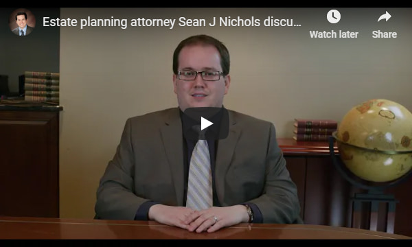 YouTube video overlay that plays a video of estate planning attorney Sean J Nichols discussing the aspects of estate planning in Michigan