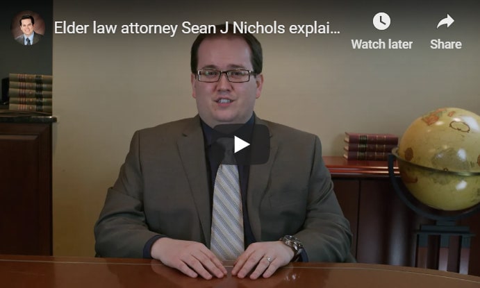 YouTube video overlay that plays a video of elder law attorney Sean J Nichols discussing what elder law is