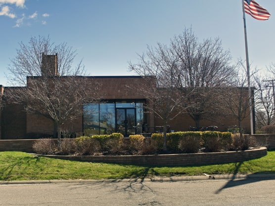 Exterior brick office building where the law firm of Sean J Nichols is located